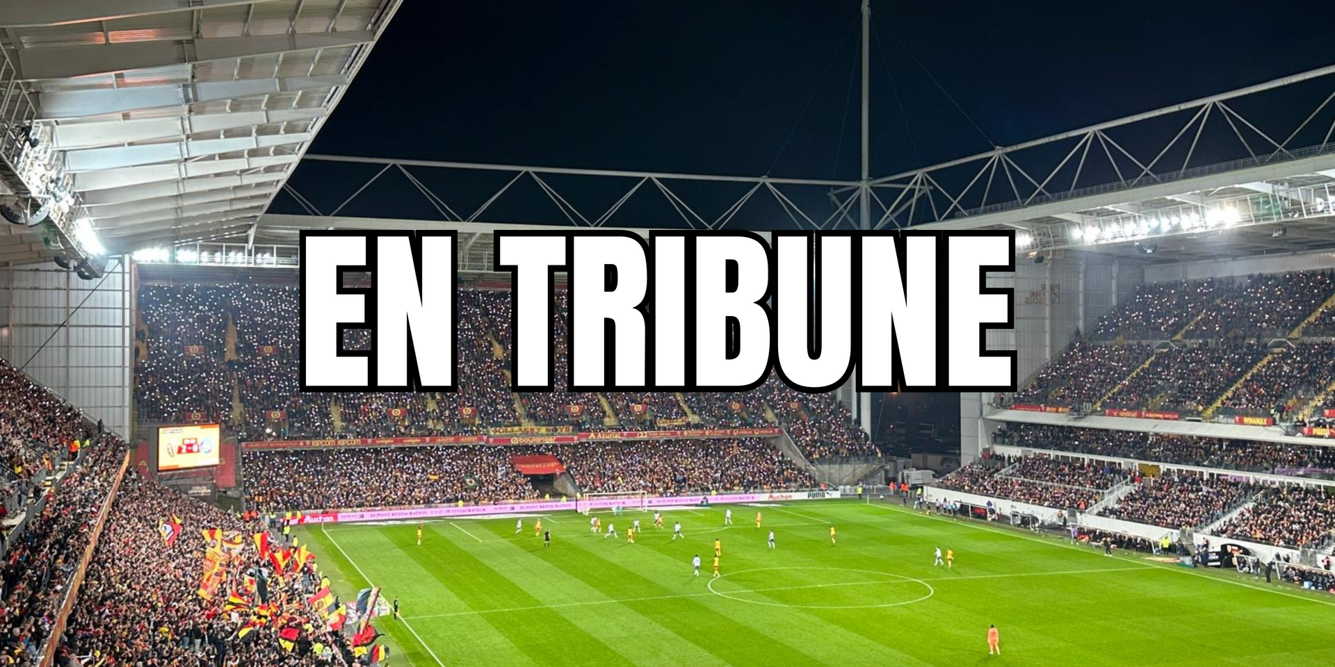 EN TRIBUNE